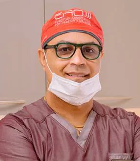 Portrait of Dr Edvin, dentist and founder of Enhance Dental Surgery Crawley